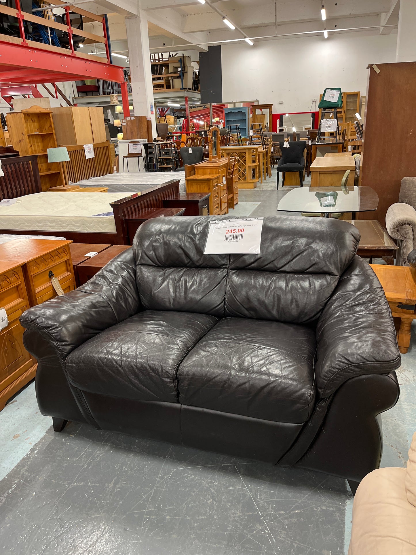 2 seater black soft leather sofa, high back  2125