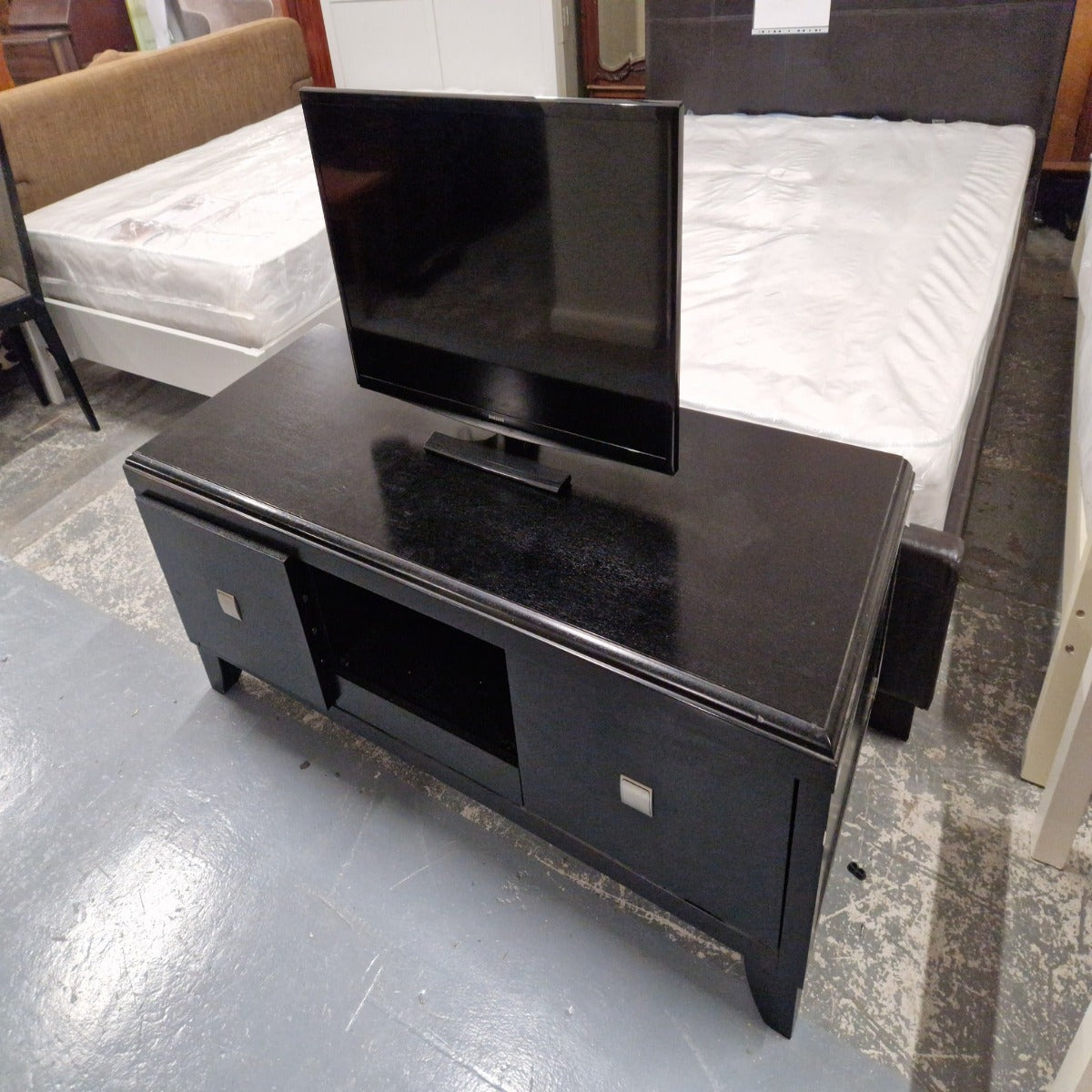 Large black two door tv unit Q3223