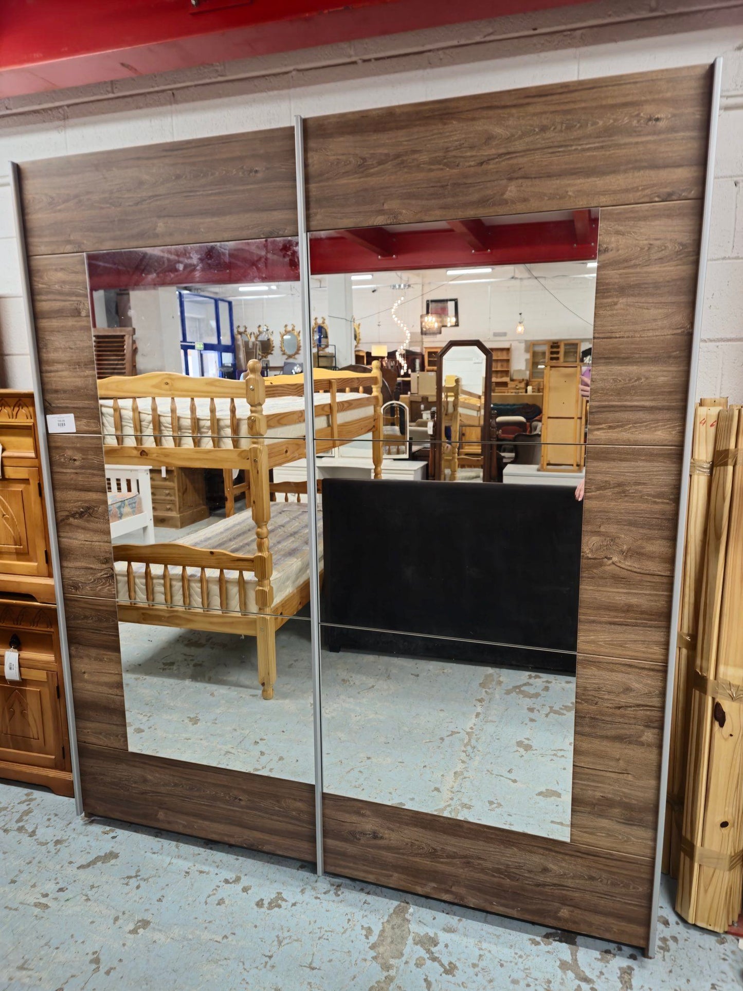 Large Walnut laminate sliding door wardrobe with full length mirrors 3324