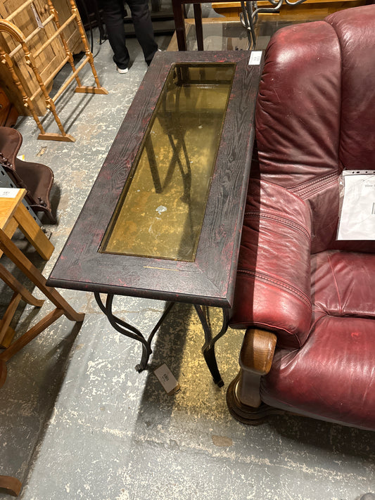 Black metal framed console table, dark wood top, frosted glass centre