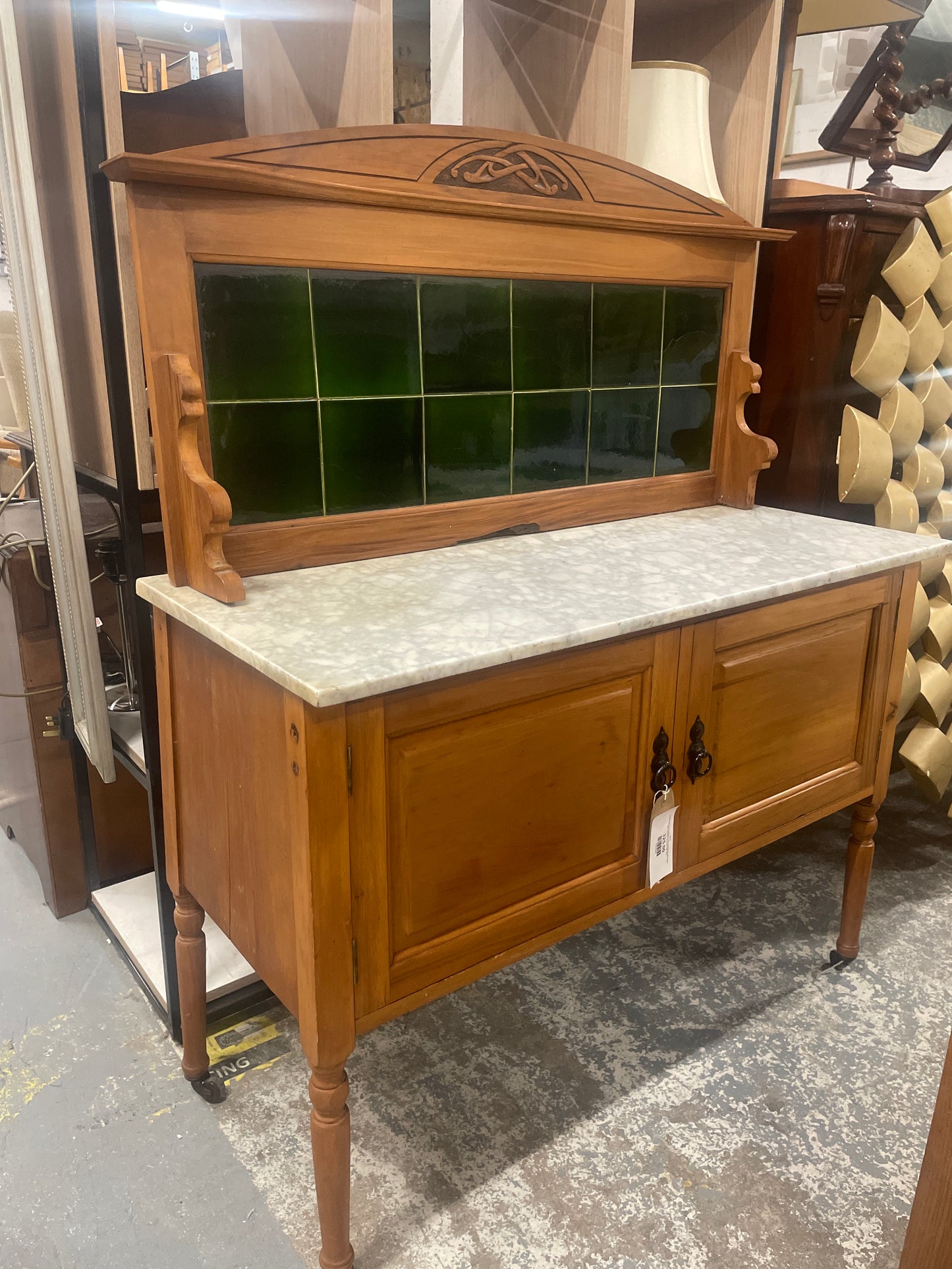 Ornate light wood stained 2 door washstand with green tiled upstand and granite top%A0 2324