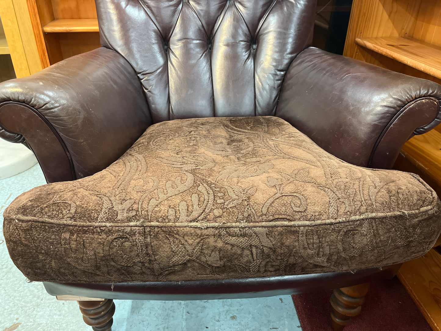 Wing back brown leather chesterfield armchair with brown fabric cushion  2125