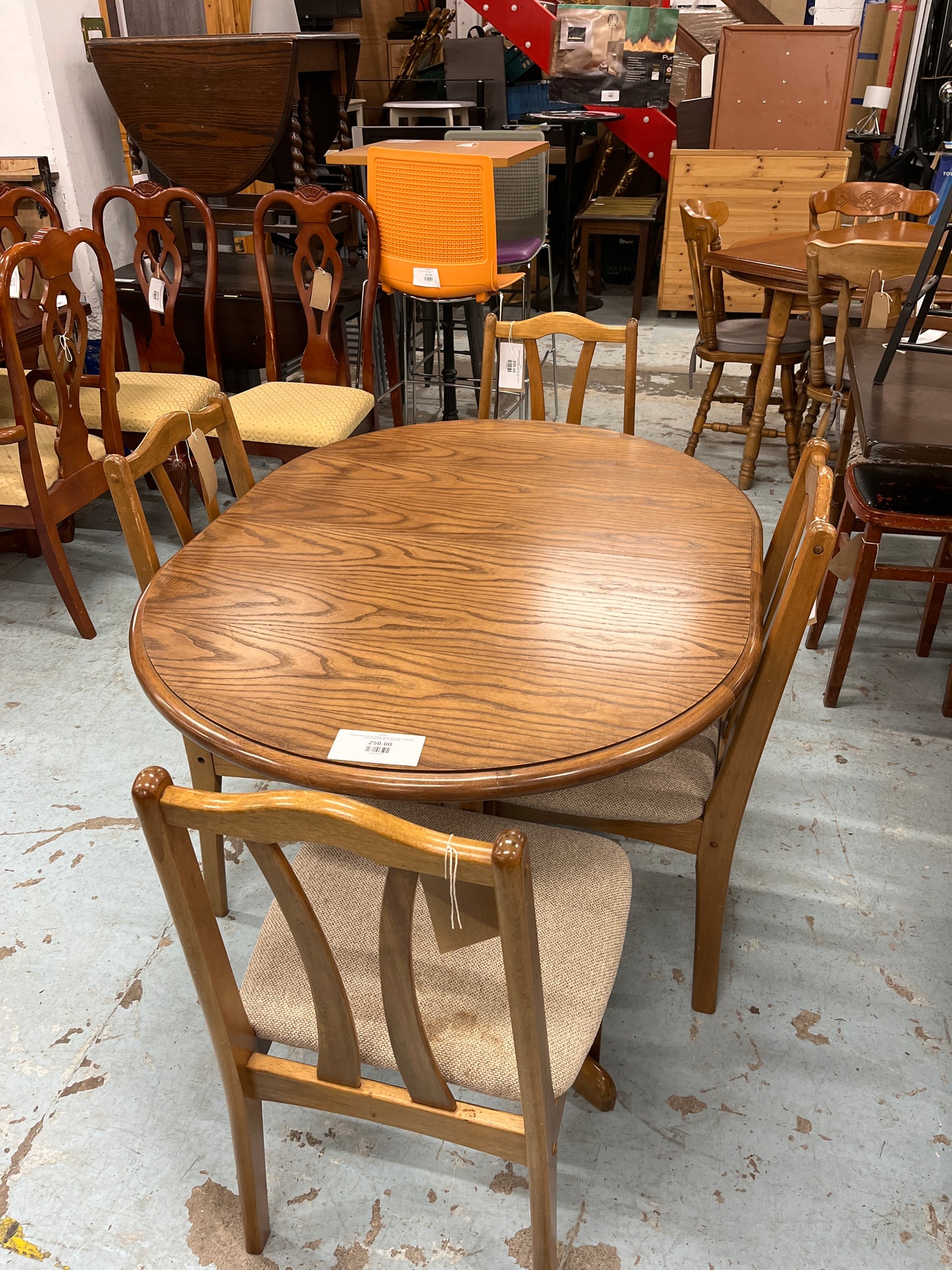 Stained Oak oval extendable dining table with 4 matching chairs with grey fabric seat 2125