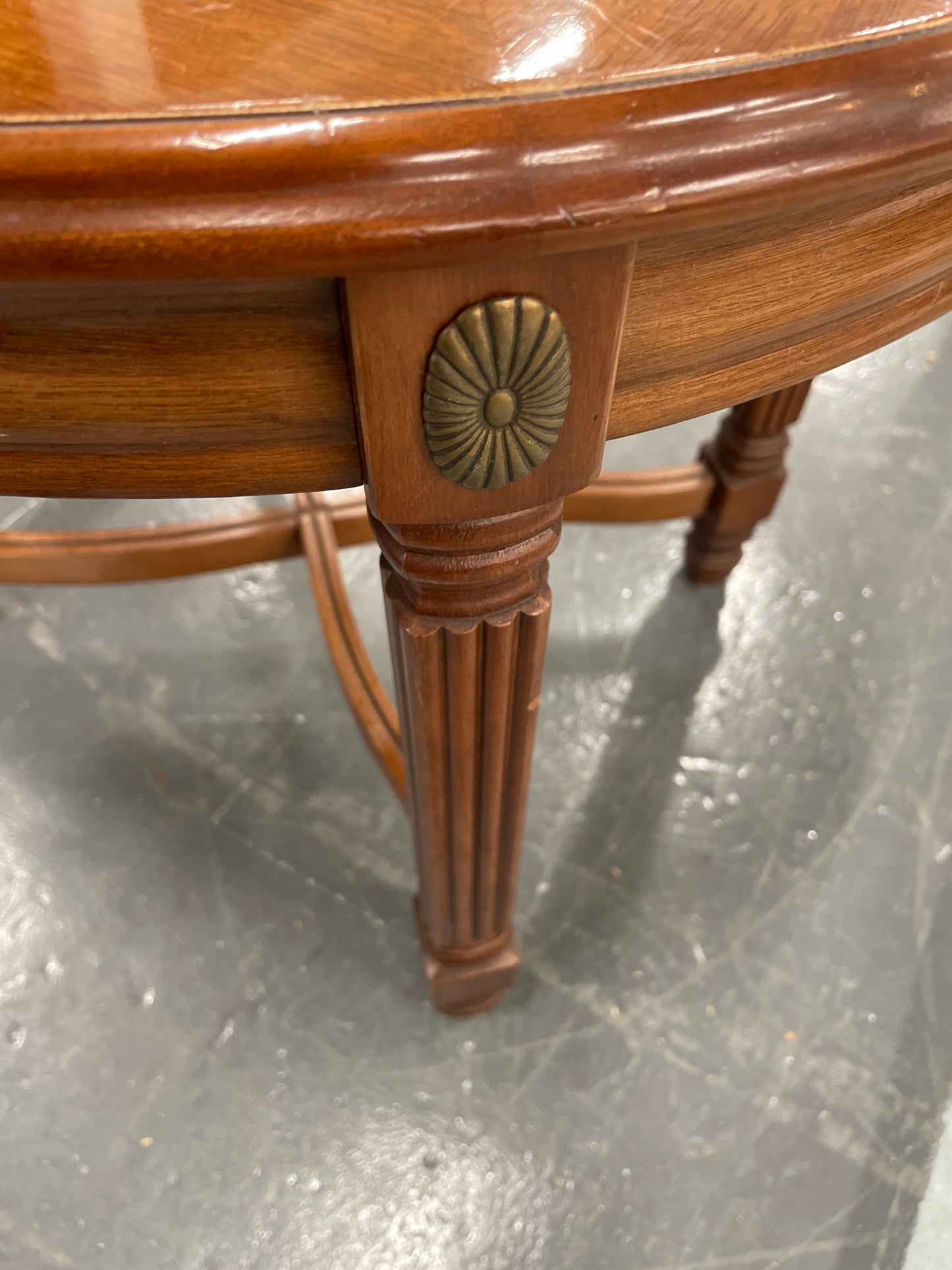 Low mahogany inalid circular coffee table and ornate detailing  1125