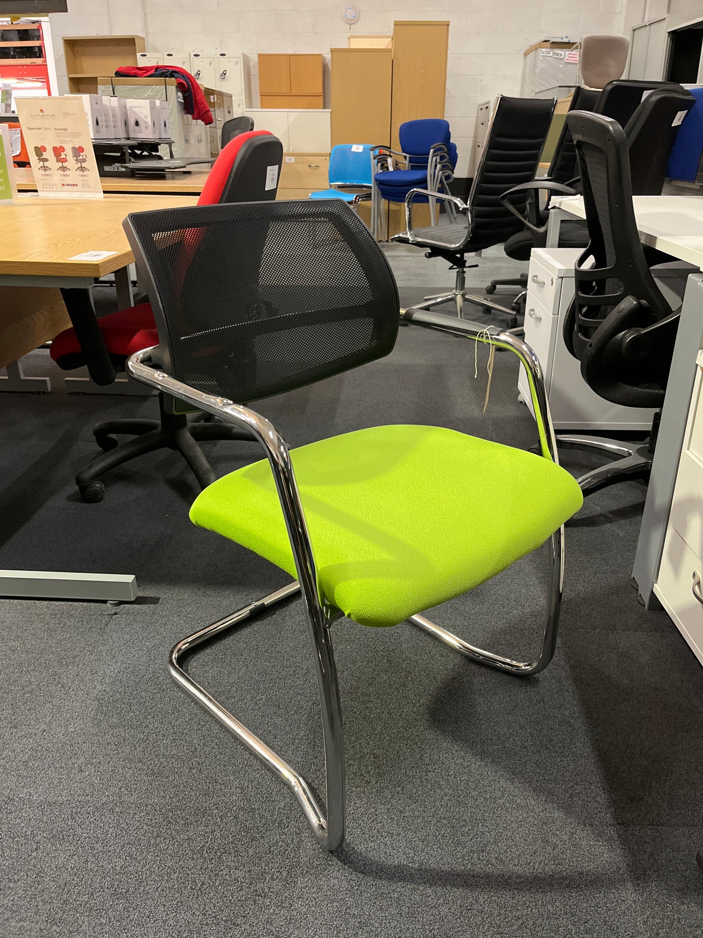 Lime green fabric cantilever meeting chair, chrome frame with arms and mesh back. 3 NO. MATCHING IN STOCK