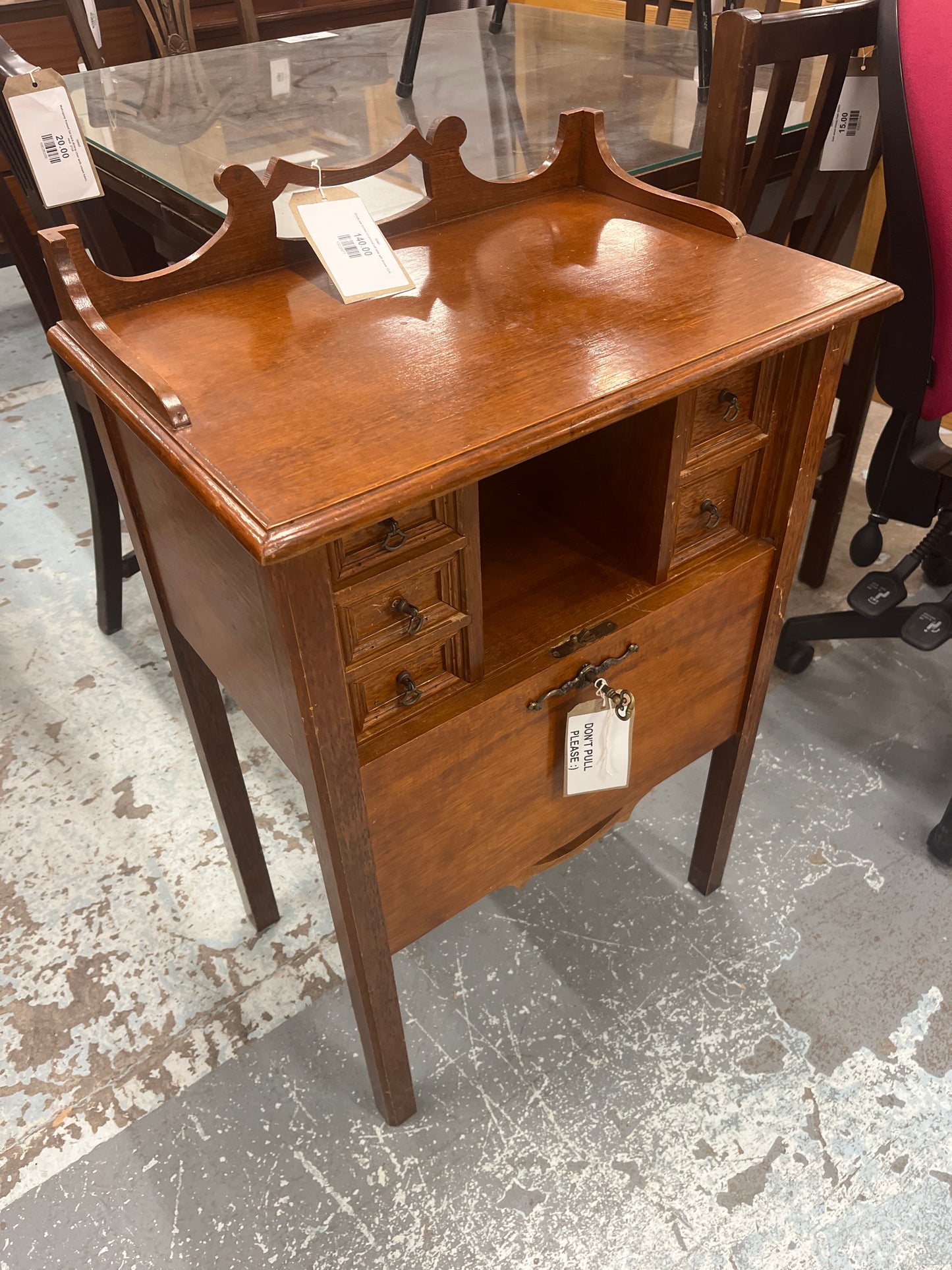 Ornate oak stained occasional tall table with drawer 3324