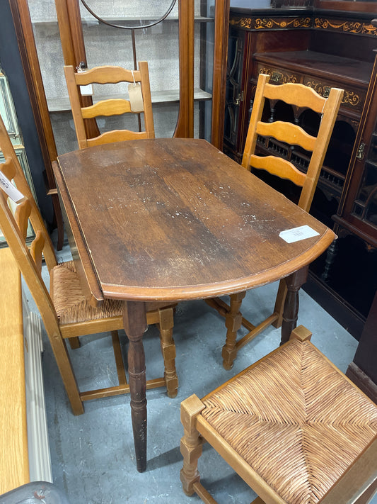 Oak stained drop leaf circular kitchen table  3324