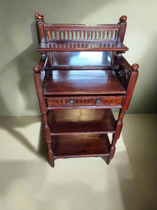 Mahogany small tiered shelf unit in hall 1125