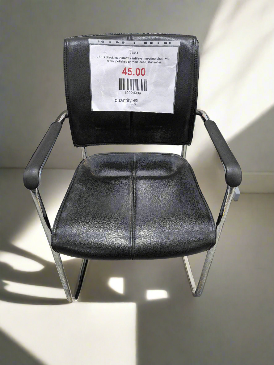 USED Black leatherette cantilever meeting chair with arms, polished chrome base, stackable