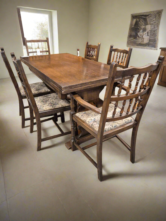 Dutch oak stained extendable dining table with 4 no. matching dining chairs and 2 no. carvers with fabric seat cushions%A0 4124