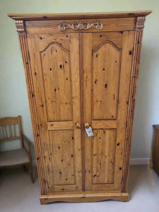 Tall ornate solid pine 2 door wardrobe  4224