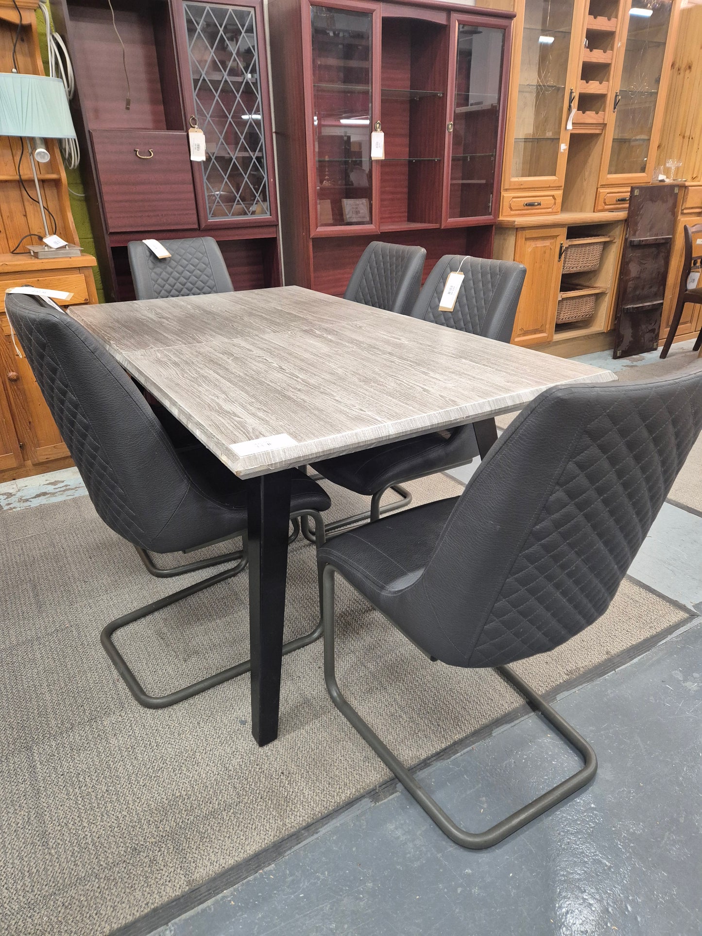 Grey Laminate extendable table with 6 matching leatherette chairs 4224