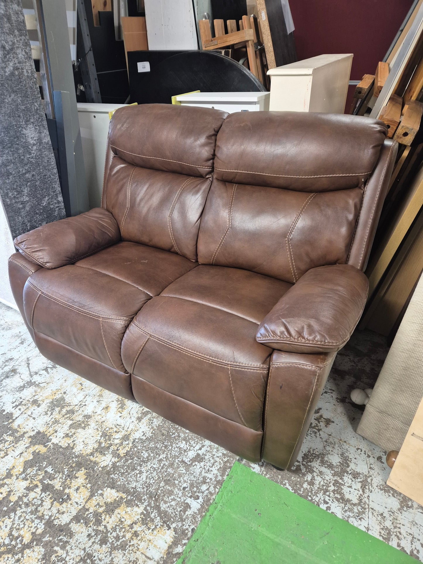 2 Seater brown leather sofa 1125