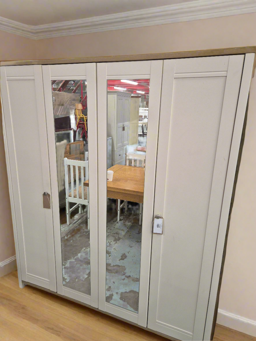 Large cream laminate 4 door wardrobe with oak laminated capping and mirrorred doors 4224