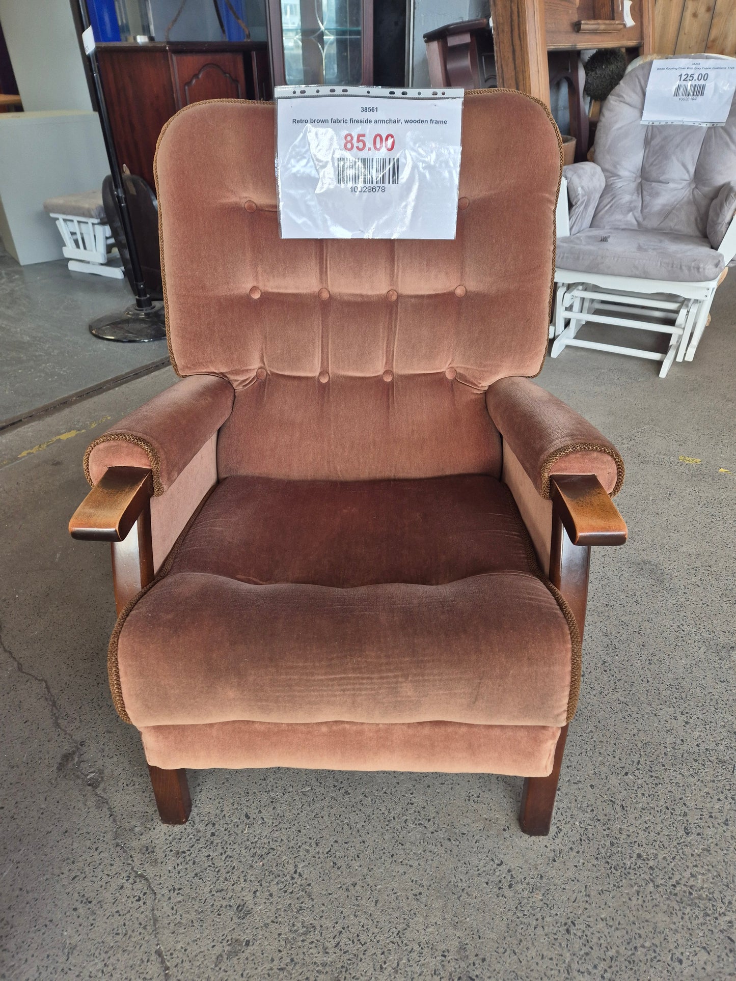 Retro brown fabric fireside armchair, wooden frame