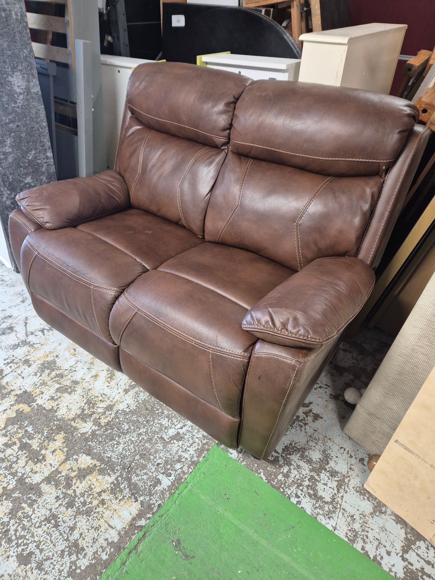 2 Seater brown leather sofa 1125