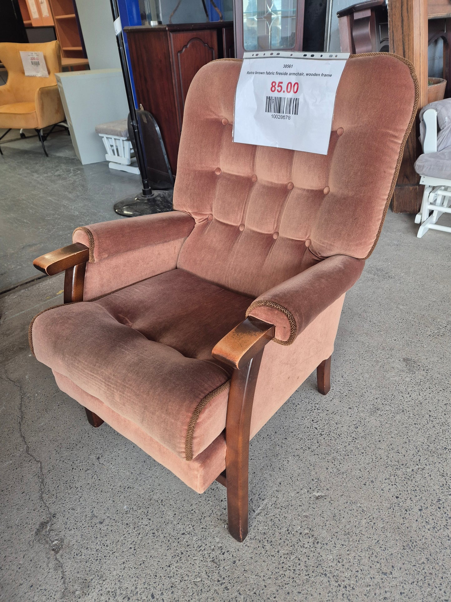 Retro brown fabric fireside armchair, wooden frame