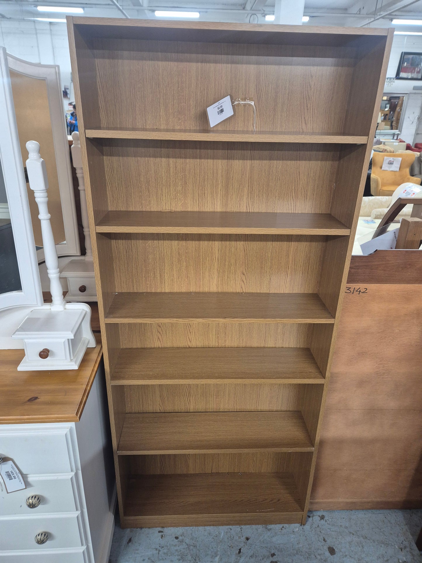 Tall oak laminate slim open bookcase  1125