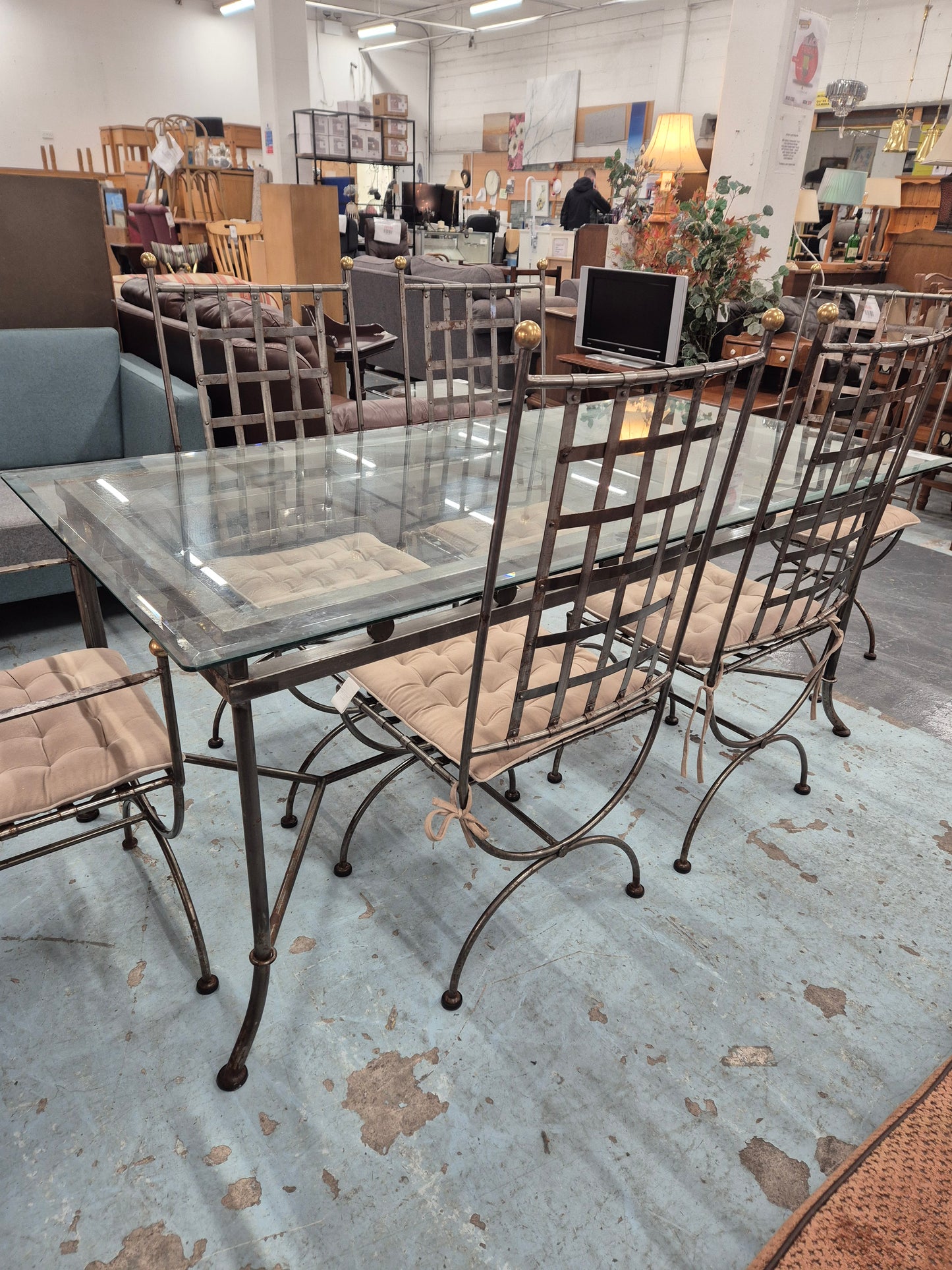 Ornate silver metal framed, rectangular glass top dining table with 6 no. metal chairs with cushions 4224