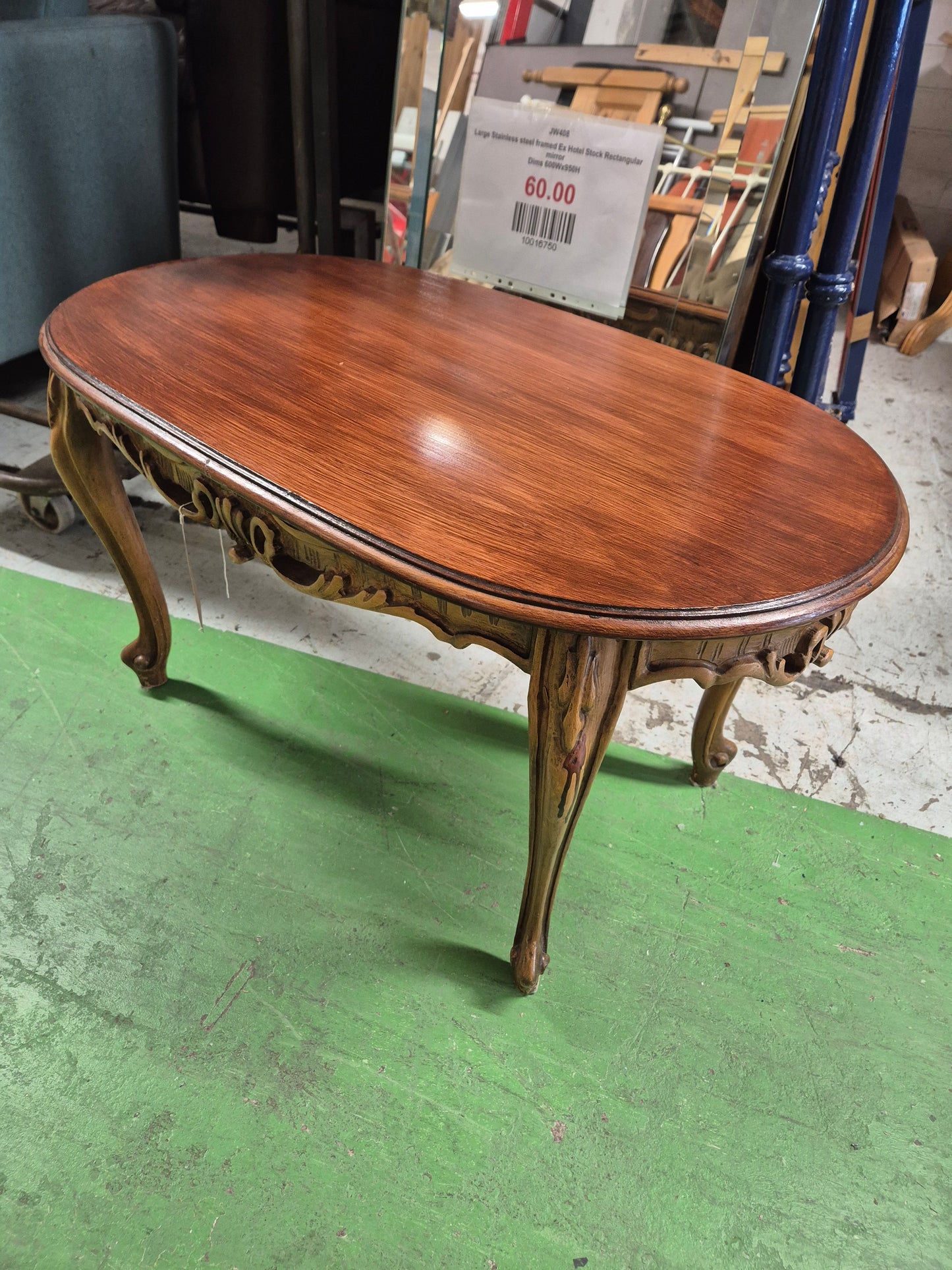 Oval low mahogany coffee table  1125