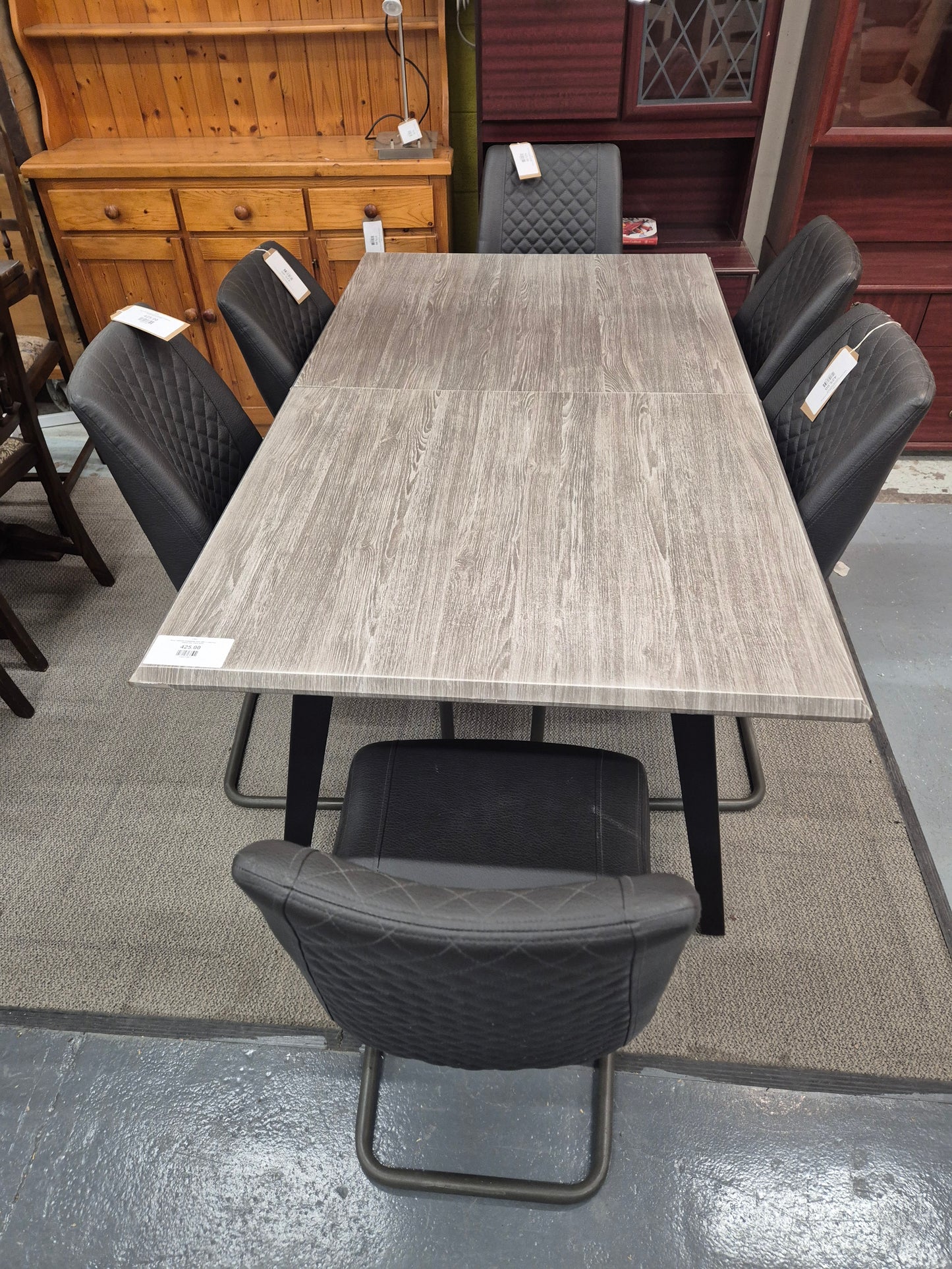 Grey Laminate extendable table with 6 matching leatherette chairs 4224