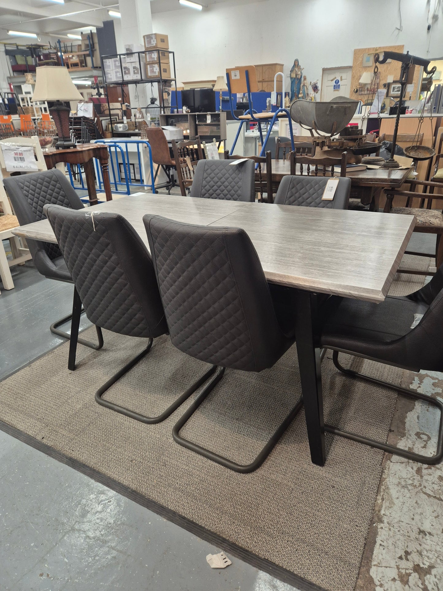 Grey Laminate extendable table with 6 matching leatherette chairs 4224